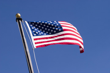 American flag blowing in the wind