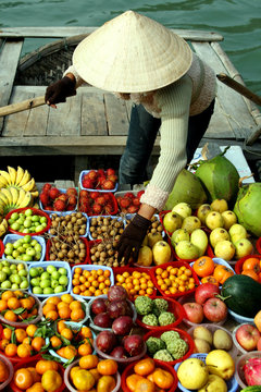 some fruits on boat - vietnam