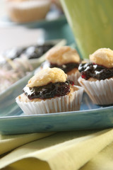 Madelaines stuffed with backberries marmalade, close up