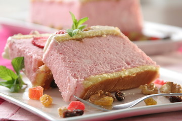 Recipe of cold strawberries mousse dessert, with nuts and grapes