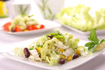 Fresh salad with corn and basil