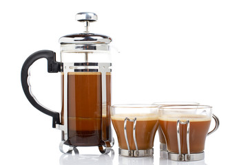 A three cups and coffee pot reflected on white background