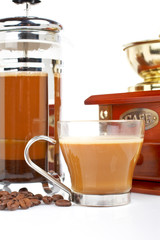 Cup, grinder and coffee pot, reflected on white background