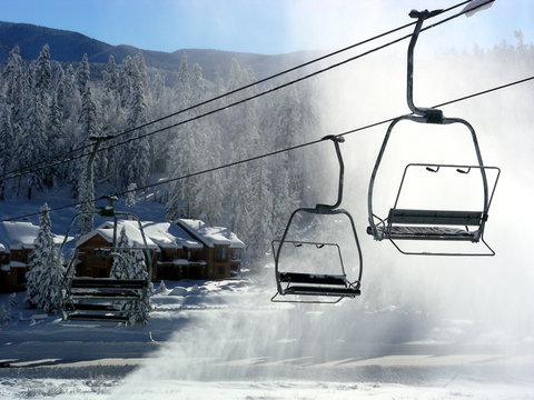Ski lifts operating amid the windblown snow