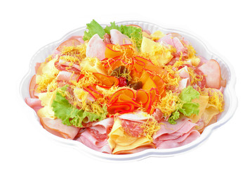 Salami slices and cheese on the cold cut tray in buffet