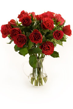 Beautiful red roses in a vase on a white background..
