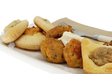 Delicious crab cakes and other assorted finger foods.