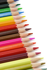 Assortment of color pencils arranged in a row