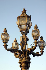 Fototapeta na wymiar latarni - Pont Alexandre III, Paryż
