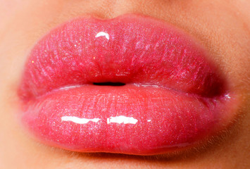 sexy glowing pink lips close-up