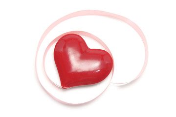 Red Heart Symbol with Gift Ribbon on White Background