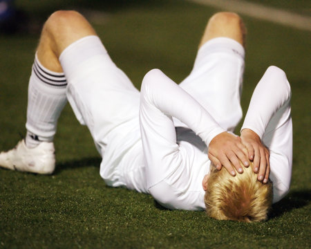 Soccer player saddened after game loss