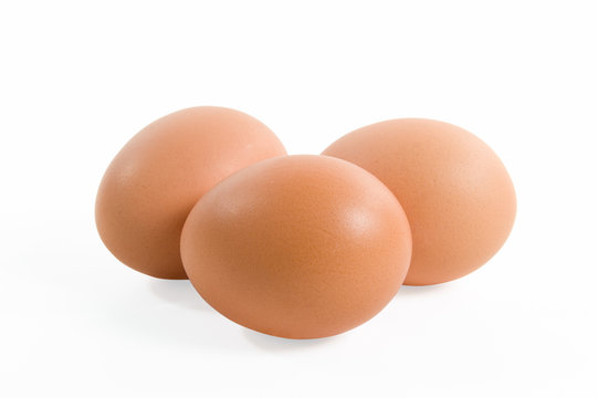 Three eggs isolated on a white background.