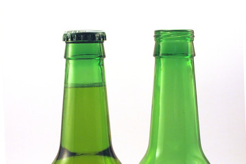 two beer bottles, one empty