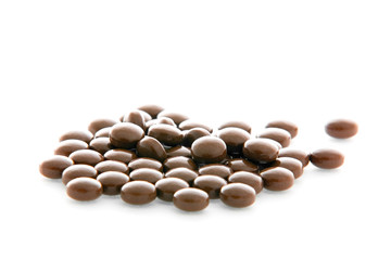 Heap of pills isolated on white