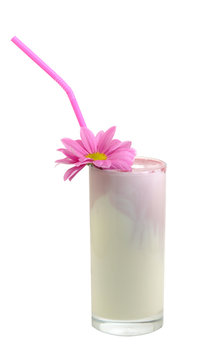 glass with a  milk - shake and flower