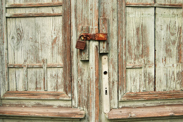Lock on old woden door..