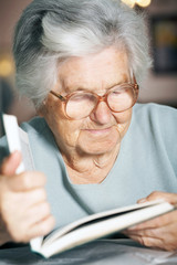 Senior woman reading a book