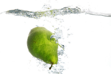 An image of pear falling in water