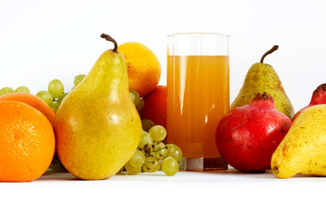 A still-life of fruits and juice