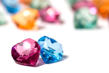 Magenta, blue and a group of colored glass hearts