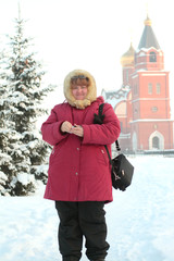 pretty russian plump woman photophrafer in frost winter