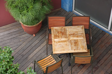 casual dining restaurant with wooden table and chairs