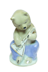 porcelain figurine of brown russian bear with balalaika