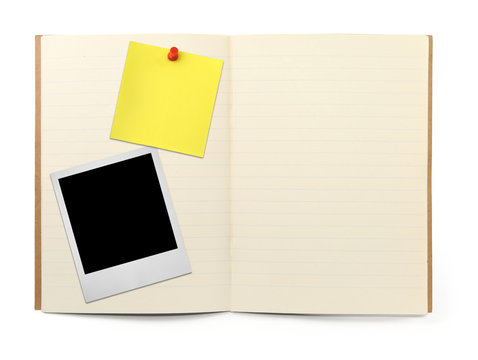lined exercise book with photo frame and yellow note, 