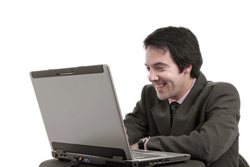 young man and working with is laptop