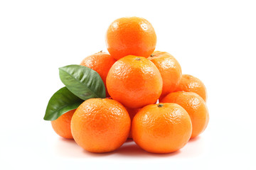 pile of fresh tangerines isolated on white