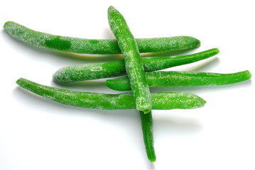 Frozen green beans isolated on white background