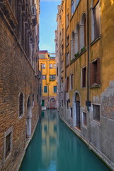 Obraz na płótnie Canvas Narrow canal in Venice, Italy