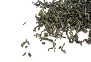Green tea leaves on white