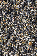 Detail of a beach: pebbles close up texture