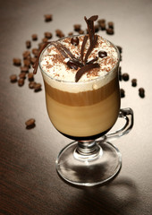 late coffee with chocolate and coffee grains