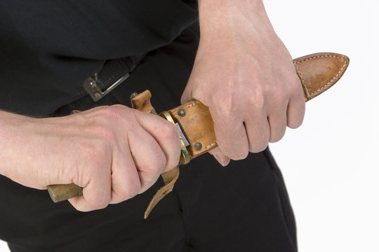 Hands with a knife