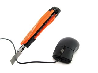 Obraz premium Computer mouse cut off with knife