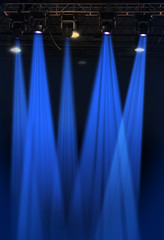 Stage lights in blue with metal rack