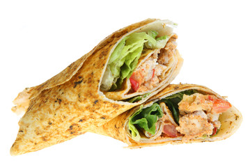 Spicy curried chicken pieces in a tortilla wrap