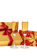 Giftboxes and champagne isolated on the  white
