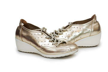 Shiny woman shoes isolated on white background