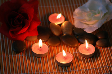 Aromatic candles and  pebbles for spa session