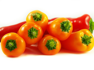 Mixed sweet peppers over white background