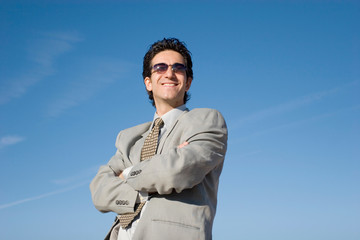 Young businessman smiling