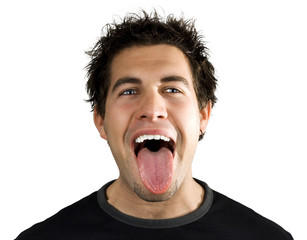Young man screaming and smiling with his tongue out.