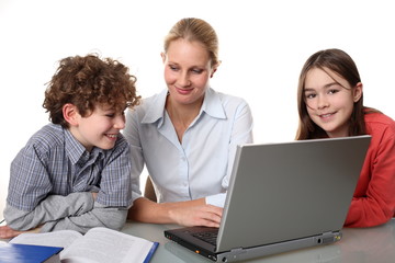 Woman with kids at the computer