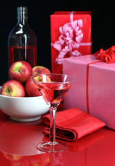 A party table set with gifts and cocktails