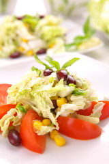 Fresh tomato salad with corn and basil