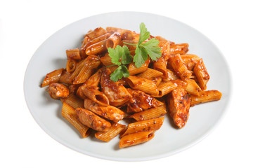 Penne pasta in a sun-dried tomato and olive sauce